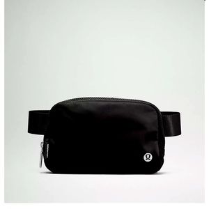 Lululemon Black Everywhere bag with silver detail.